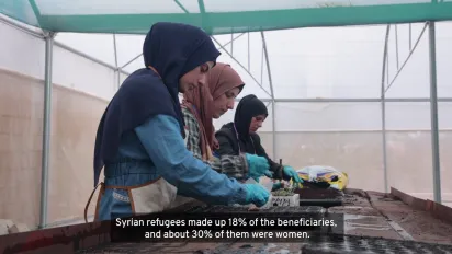 women farmers working at a green house