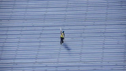 A worker building the MRT roof in Indonesia
