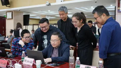 Trainees discussing the group project, actuarial training in social security in China, Apr 2025