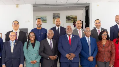 A formal group photograph featuring Caribbean Ministers of Labour and senior officials gathered during the 13th ILO Meeting of Caribbean Ministers of Labour in Guyana