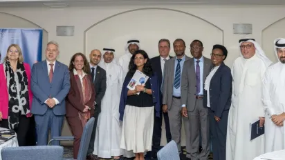 Participants stand for a group photo during the launch of the 2nd phase of the ILO's FAIRWAY programme