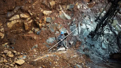Worker in an open cast mine in Madagascar