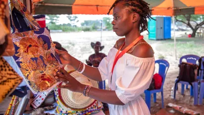 A female entrepreneur showcasing her wares