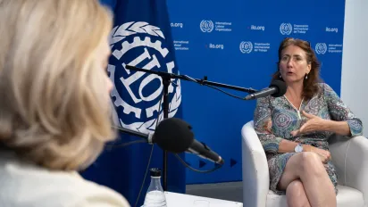 Claire Courteille-Mulder in the ILO studio recording the podcast