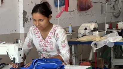 Female tailors at work.