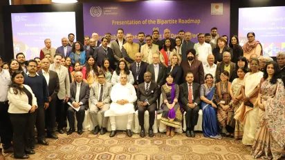 Group photo in a hotel meeting room