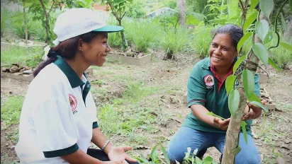 Two persons in the plantation