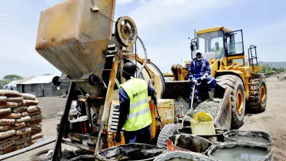 Construction workers and equipment.