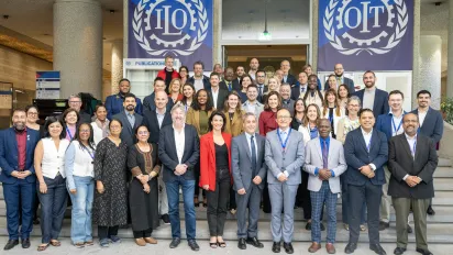 Participants are gathered for a group photo taken in ILO headquaters