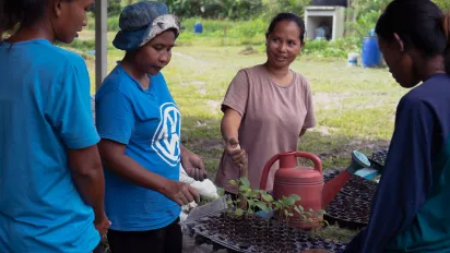 Four indigenous women in a farm.
