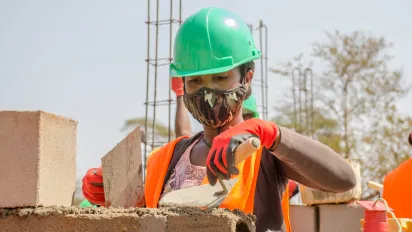 Young female construction worker in Madagascar.