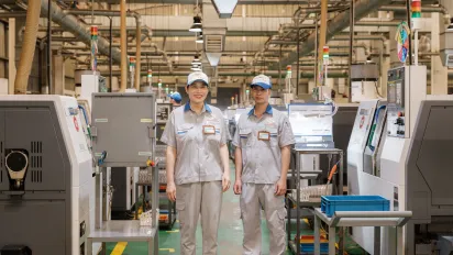 Workers on the manufacturing line.