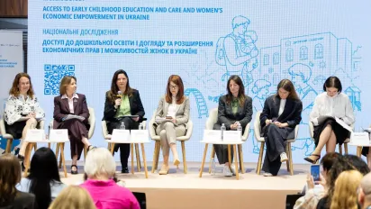 Panelists of a conference on stage