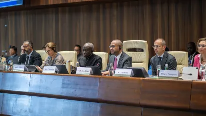 Officials seated at the main stage during the 357th session of the ILO Governing Body.