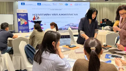Representatives from participating enterprises take part in a group exercise during the launch of the ILO SCORE Programme 2026 in Ulaanbaatar, Mongolia.