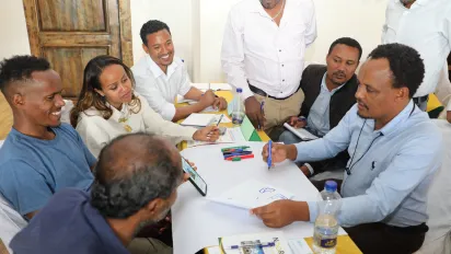 Participants engaging in an interactive group work