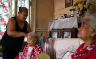 Siutiti, caregiver, brushing the hair of the elderly, Tonga