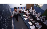 a teacher and students in a classroom