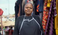 BRMM Beneficiary standing in her shop