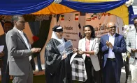 Hodan Abdilahi receiving her award at the graduation ceremony