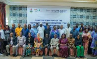 A large group of participants from government agencies, labour organizations, and development partners posing for a group photo during the Technical Working Committee meeting in Abuja