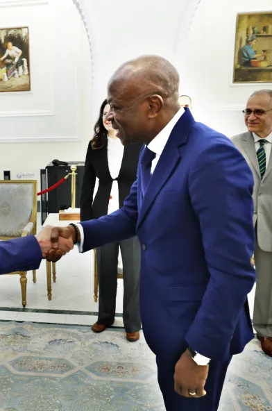 two men shaking hands.