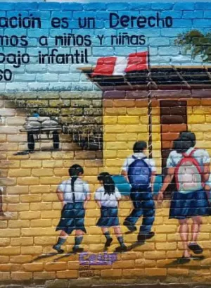 Mural painting depicting children going to school with a message on children's rights