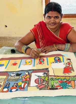 A Mithila craft artist from Janakpur during the women’s day celebration organized by the Women’s Development Center and the ILO.