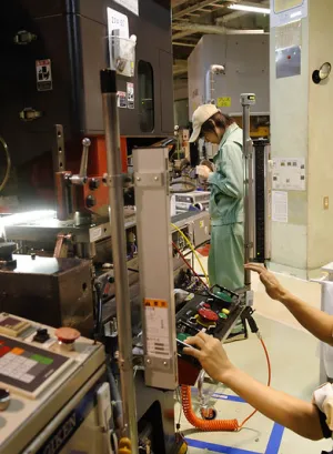 A man working in a Korean manufactory