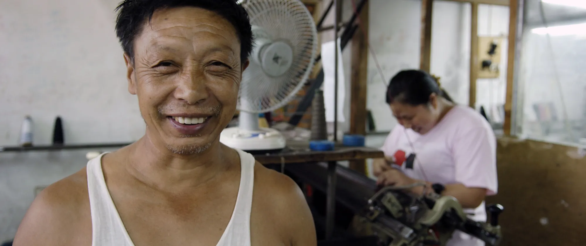 A man smiling at the camera.