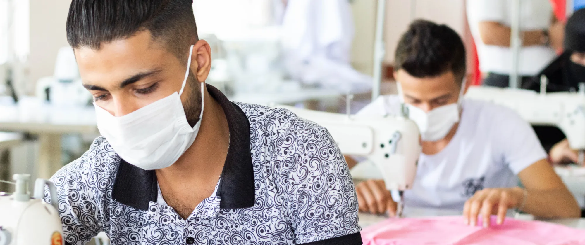 young men in textile wearing masks