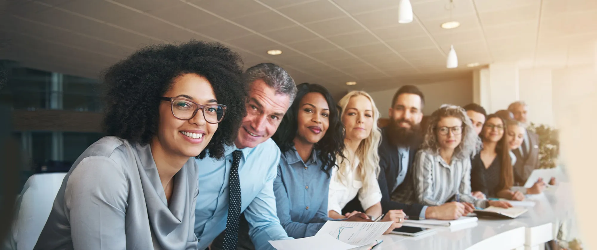 A group of diverse colleagues working together in an office