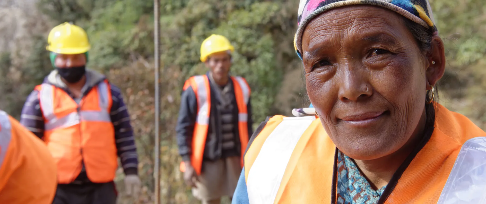 woman and men in construction