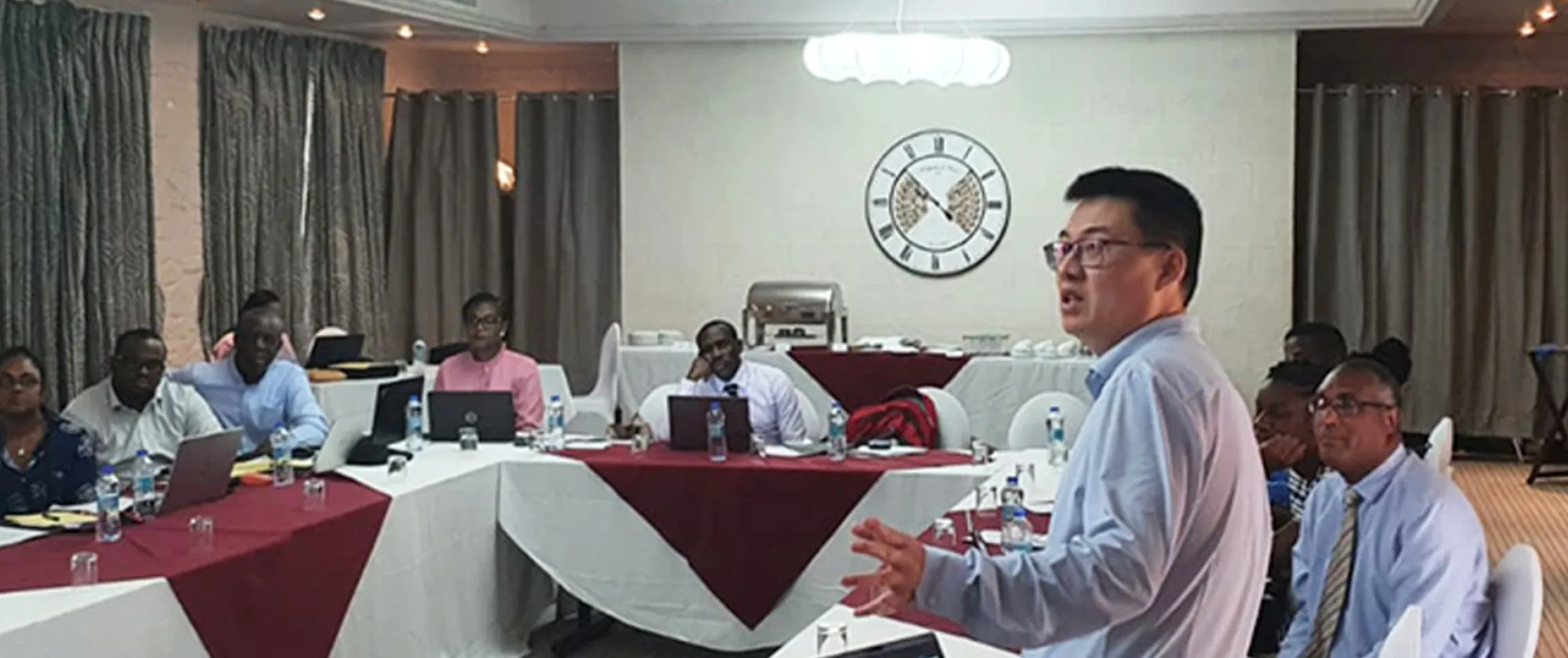 A man making a presentation to a group of people