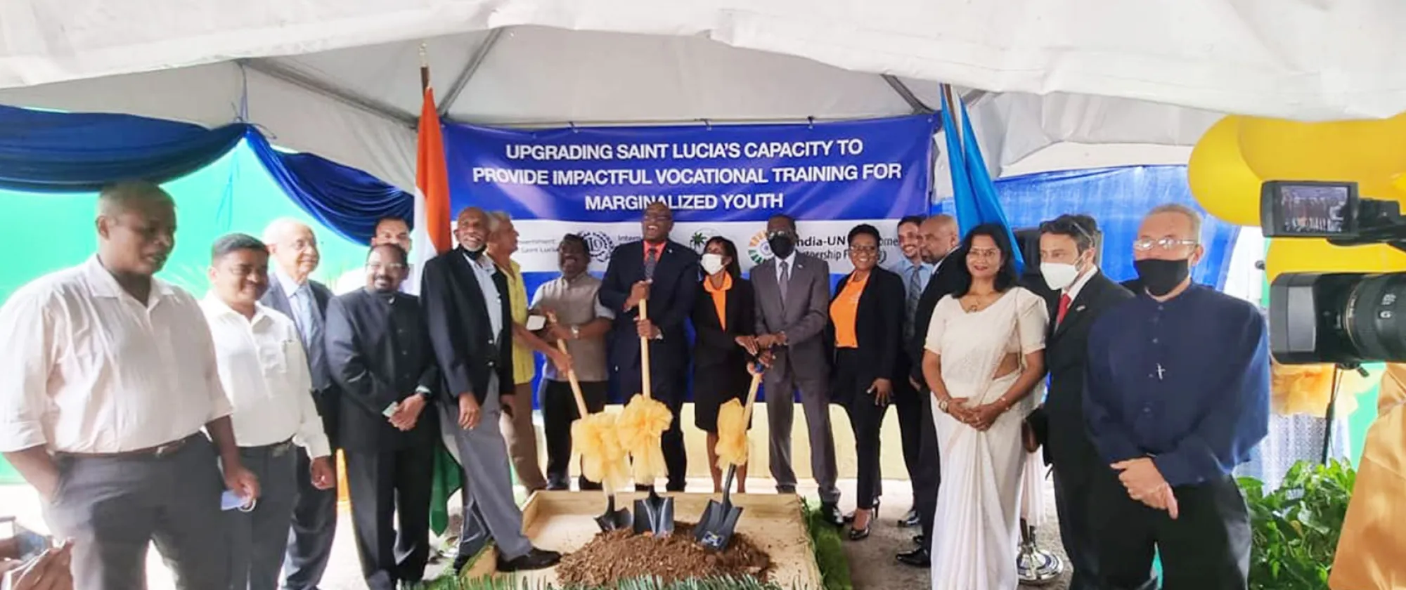 Group of people at a sod tunring ceremony in Saint Lucia