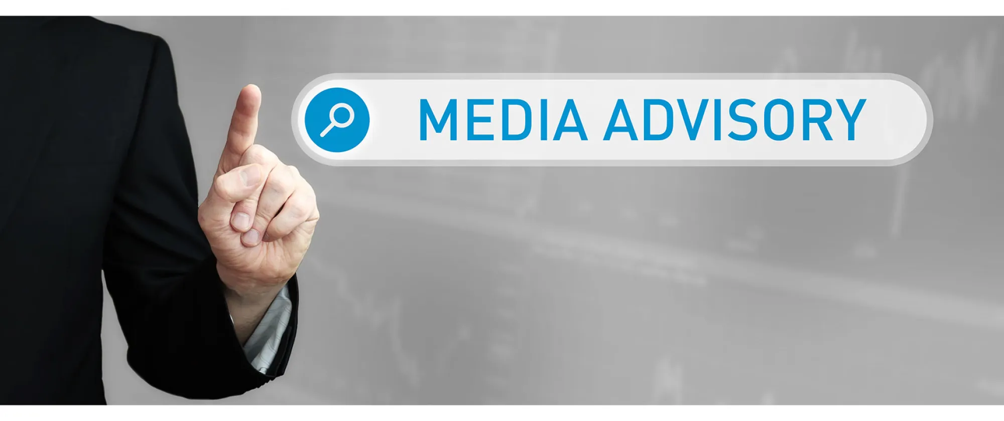 Man in a suit points a finger at a search box. The word Media Advisory is in the search