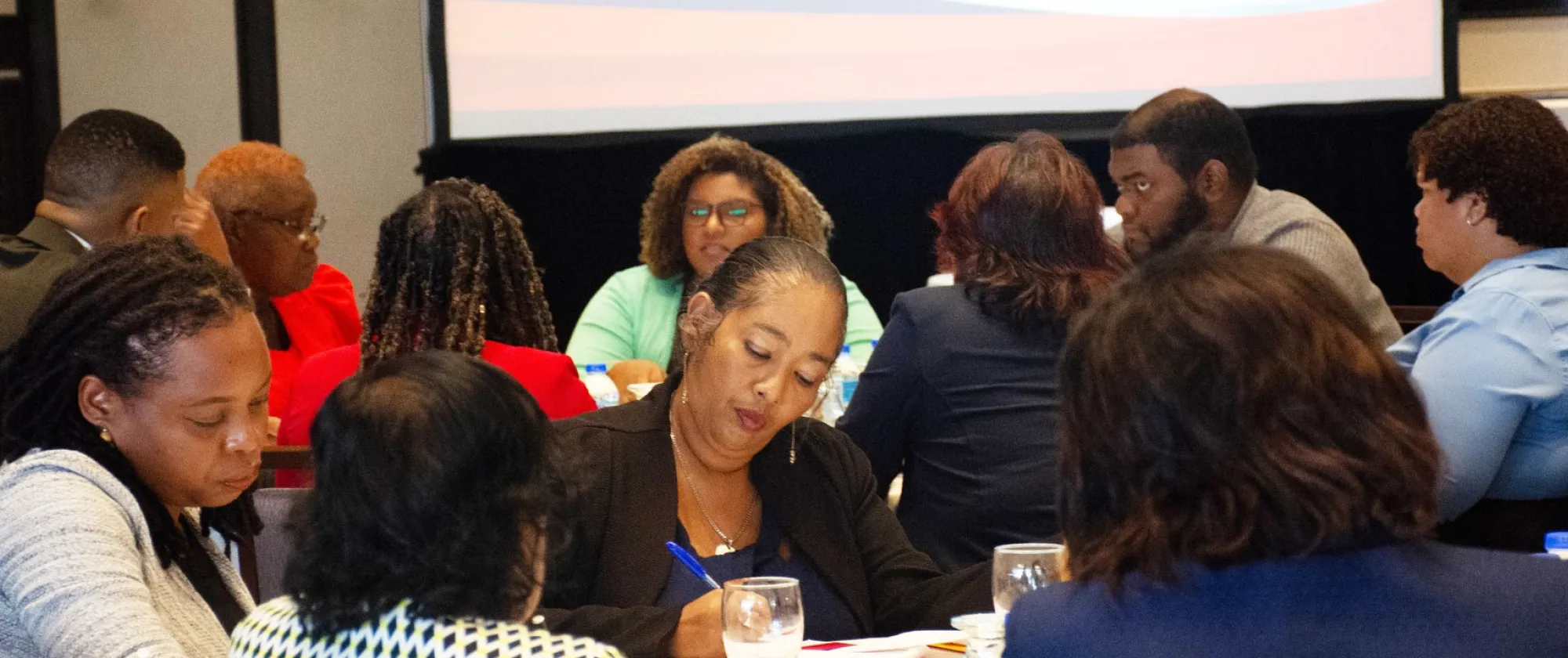 Group of workshop participants sitting at a table