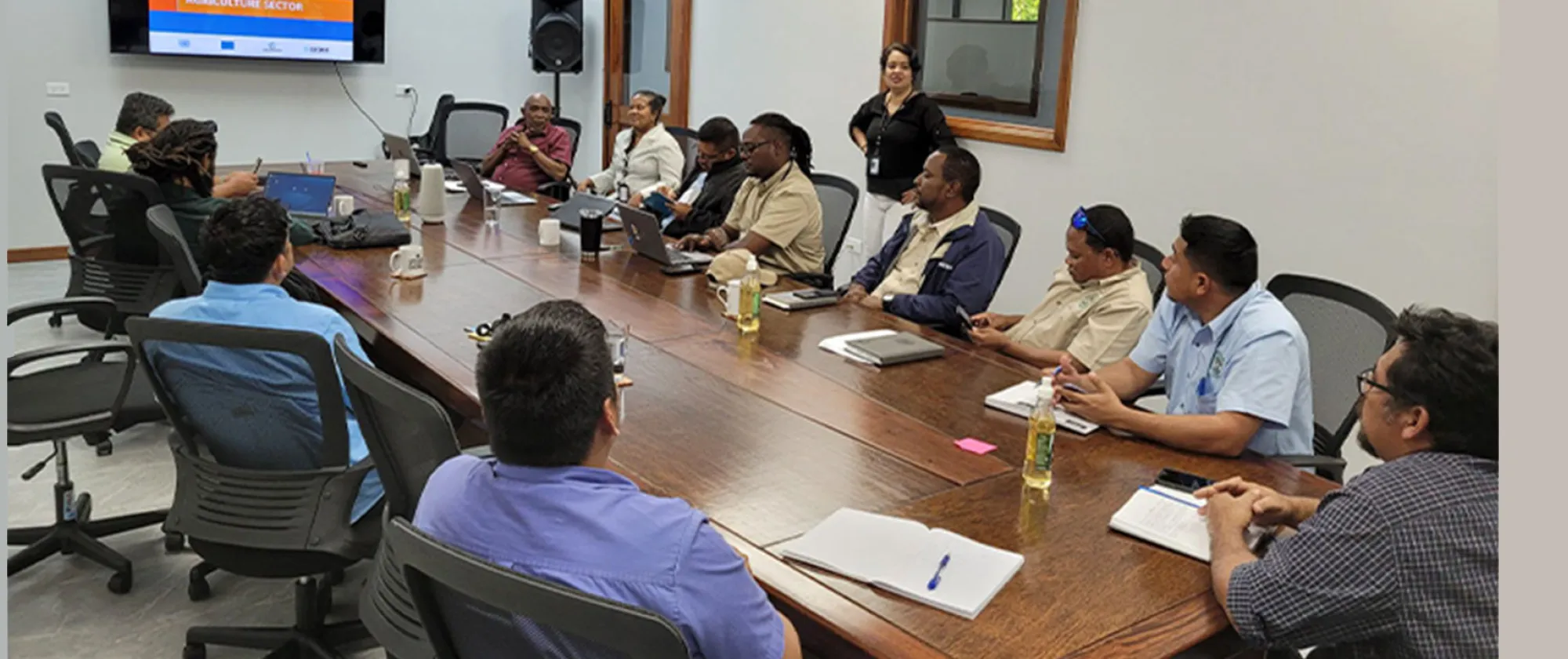 Group of people sitting around a table in discussion
