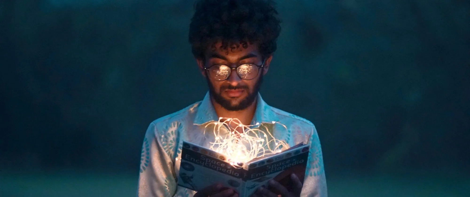 man holding a book