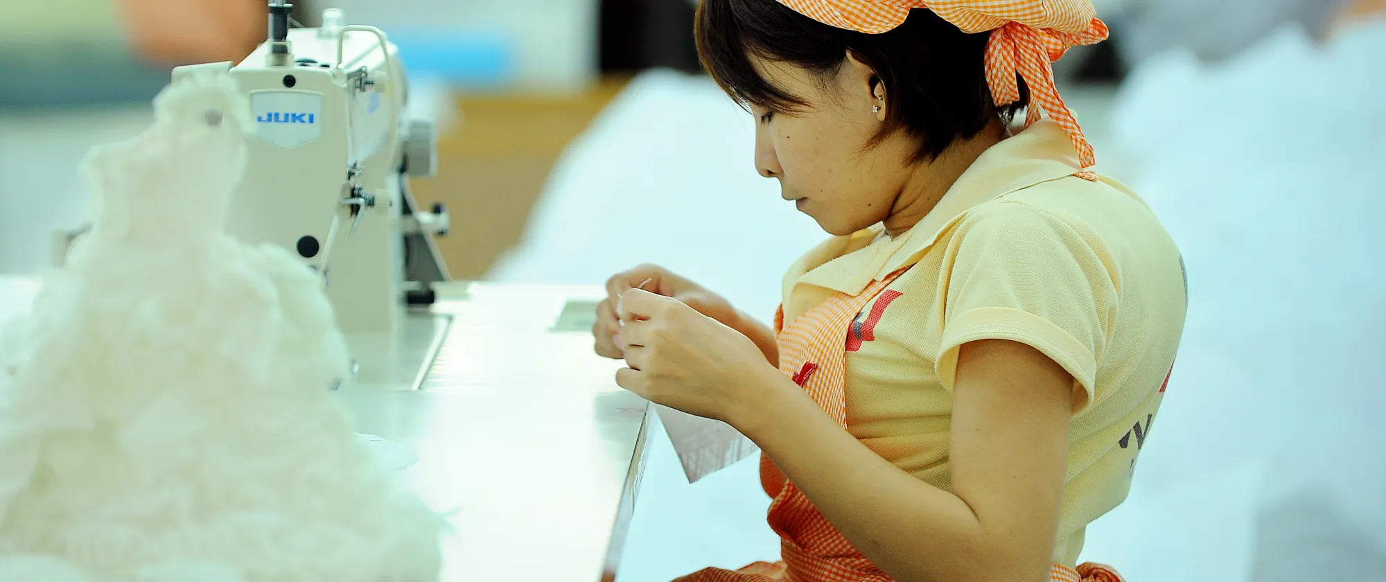 Nguyen Thi Thanh Hieu is one of the 25 workers with disabilities featured in a photo exhibition titled "Live and Work". 