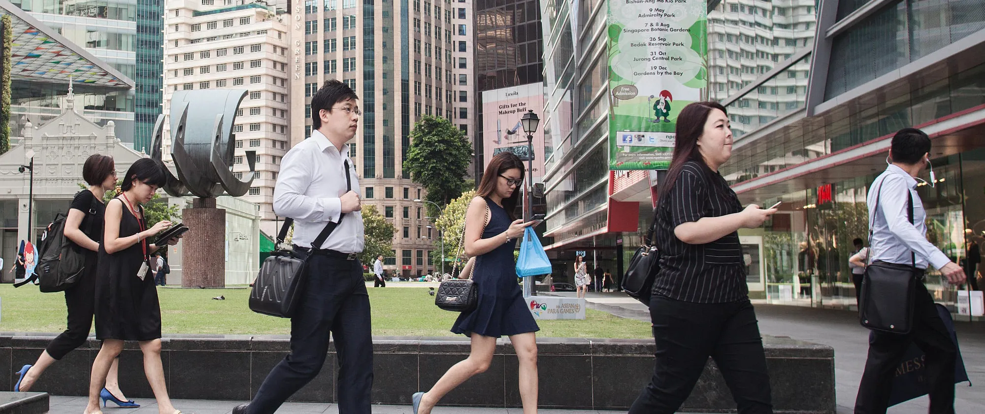 Workers heading to office in Singapore