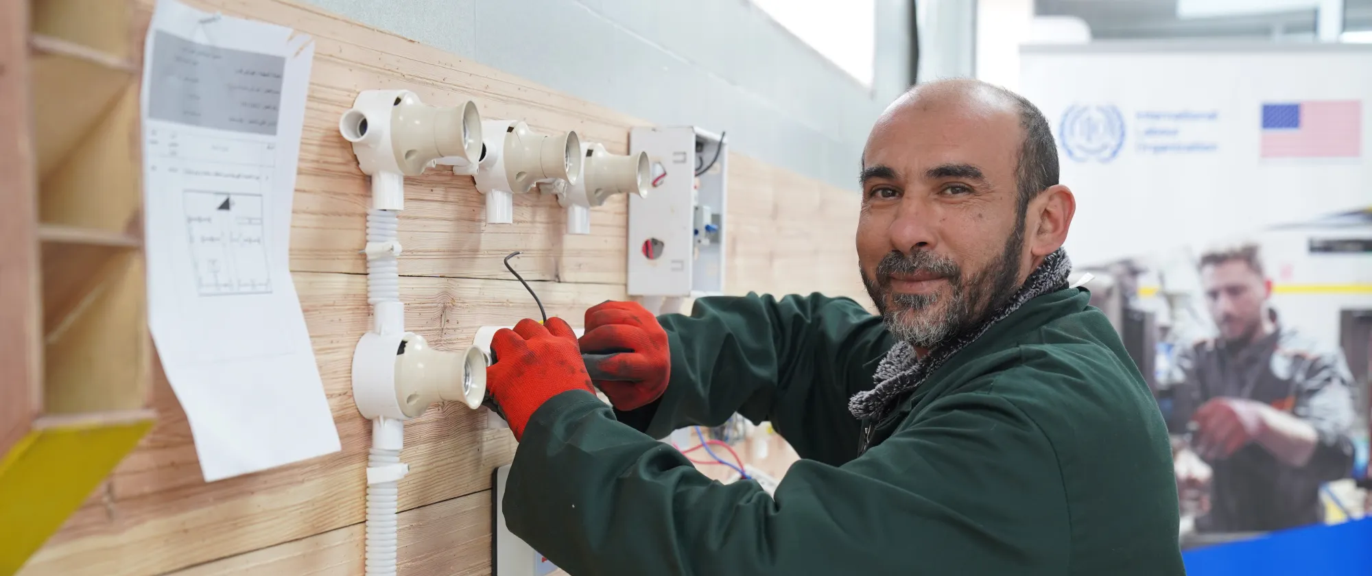 a worker fixing electrical wires