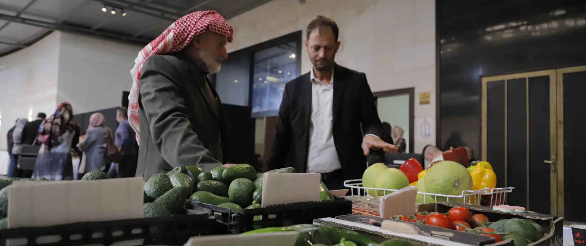 a man selling veggies