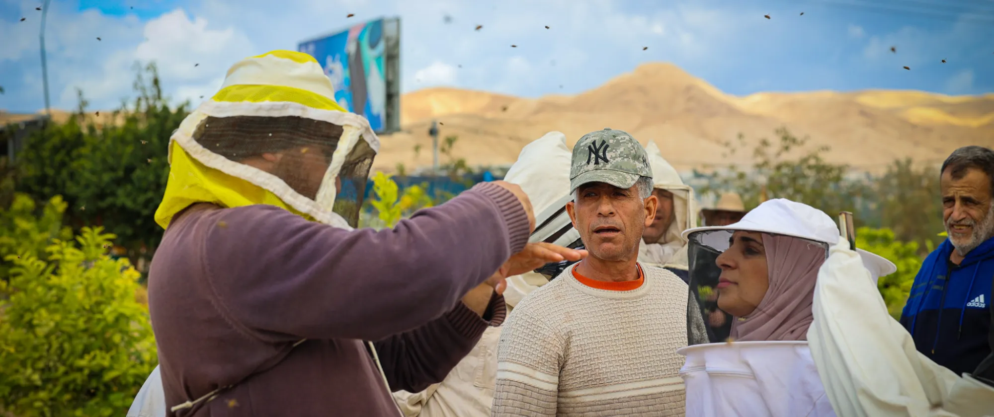 Participants of a beekeeping training and trainer in Jericho