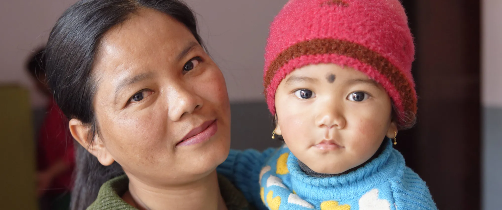 A woman and her child at the Employment Services Centre in Saurav, Nepal.