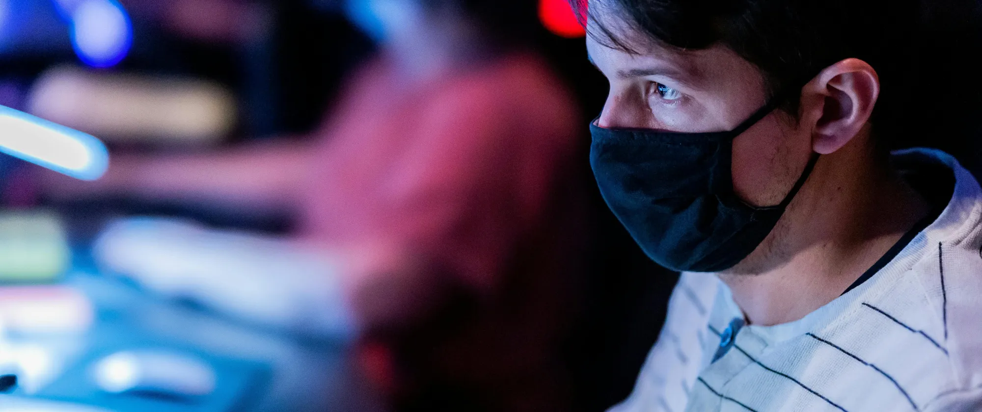 man in a mask working