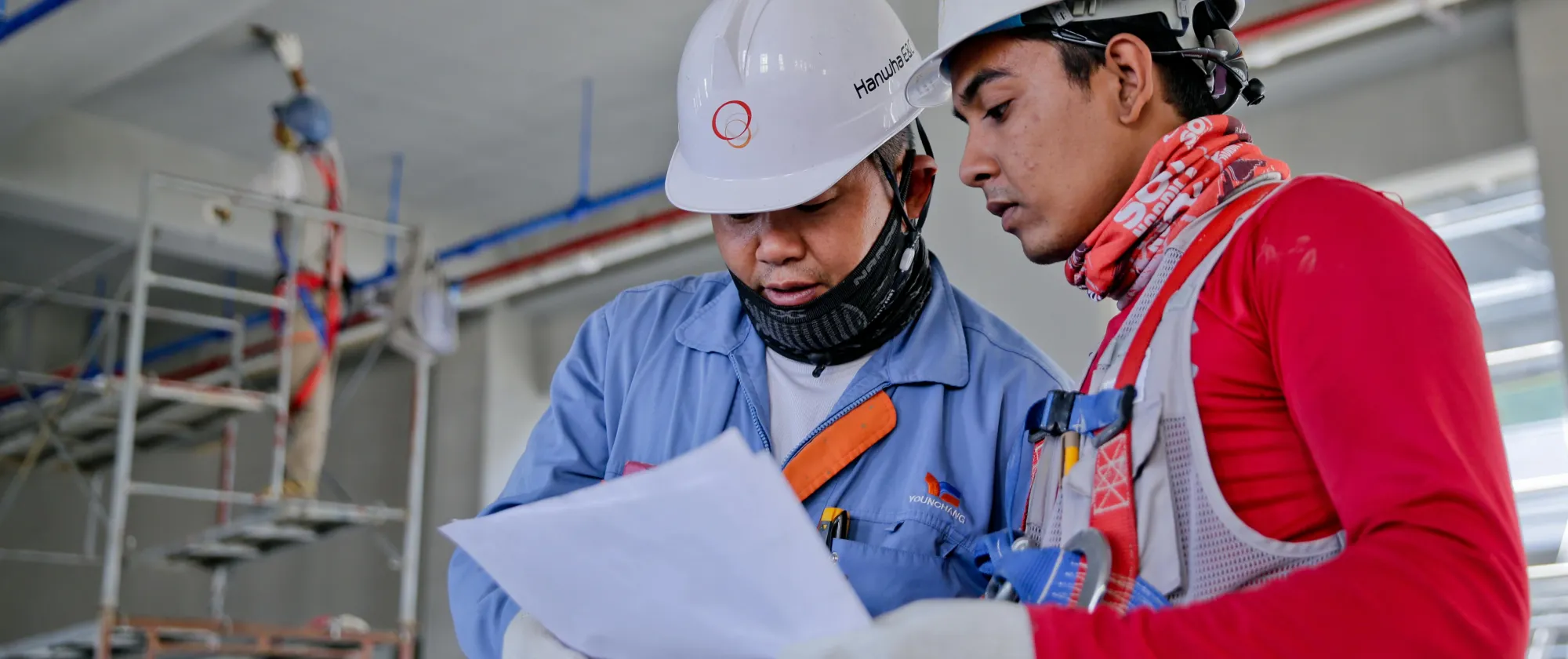 two men working in construction