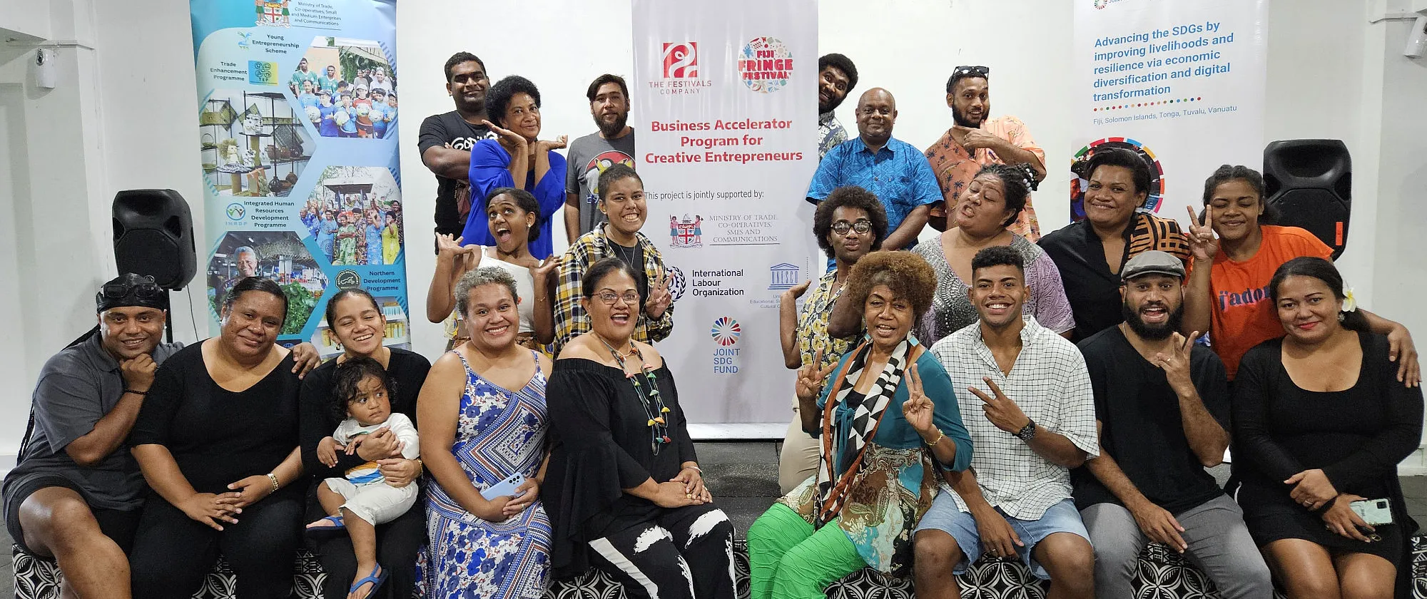 Training participants gather for a group photo