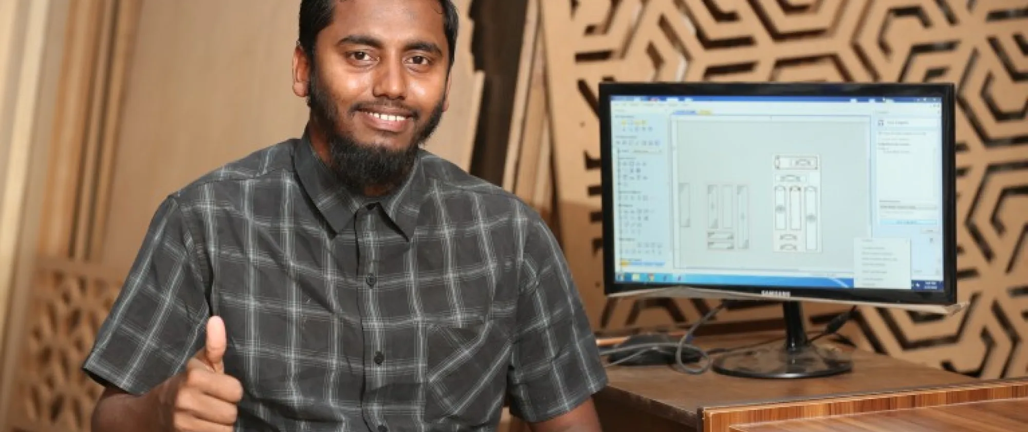 Ainul Haque Jubel at his workplace Design Park in Sylhet