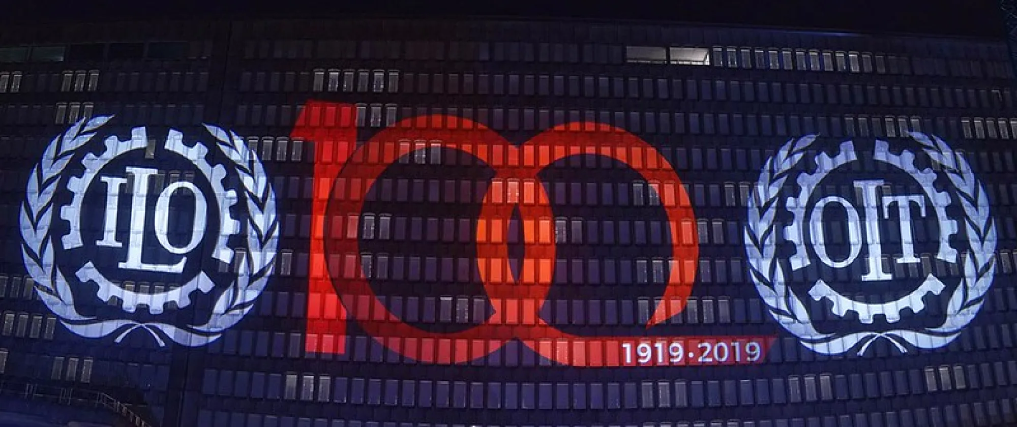 Photo of headquarter building with Centenary logo